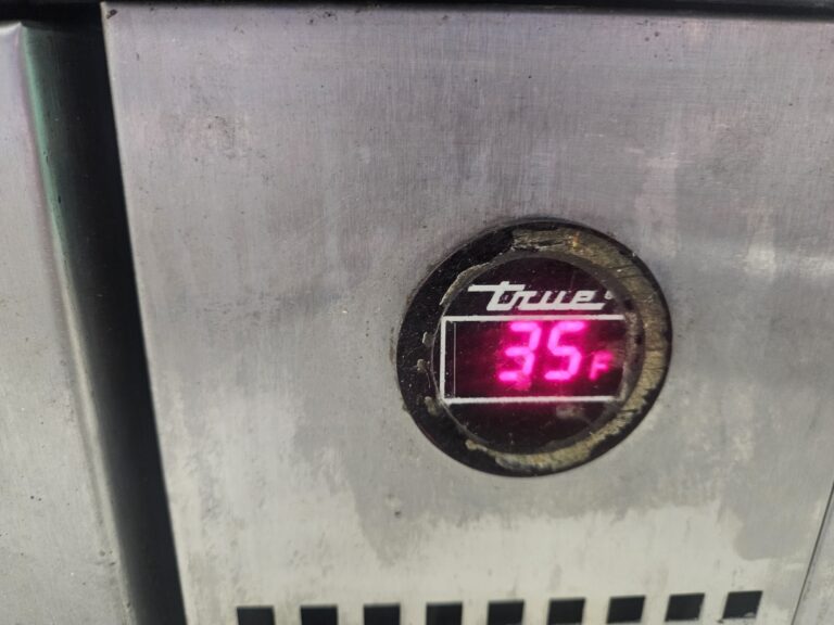 Commercial cooler temperature display showing 35 degrees F