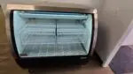 Used OMCAN Curved Glass Display Cooler