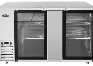 Front view of a silver Atosa MBB69GR two-door commercial back bar refrigerator. The unit features a flat stainless steel worktop, two solid swing doors with horizontal recessed handles, and is mounted on four small black swivel casters.