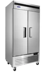 A 39.5-inch wide Atosa MBF8502 slim two-door solid reach-in freezer with a stainless steel exterior, bottom-mount compressor, and recessed door handles.
