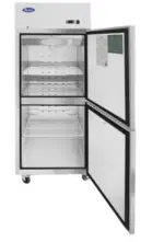 A 54-inch wide Atosa MBF8005GR commercial two-door solid reach-in freezer with a stainless steel exterior, top-mount compressor, and recessed door handles.