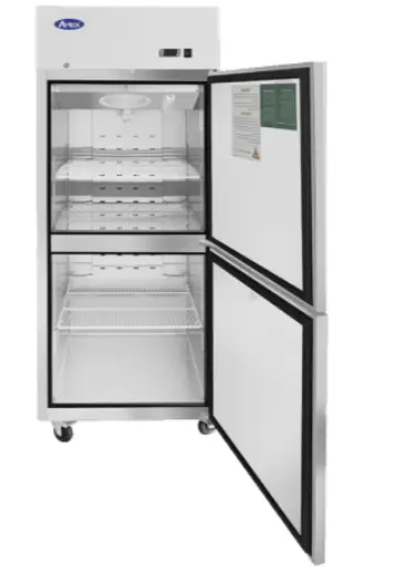 A 54-inch wide Atosa MBF8005GR commercial two-door solid reach-in freezer with a stainless steel exterior, top-mount compressor, and recessed door handles.