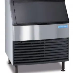 A Koolaire undercounter ice machine with a stainless steel exterior and black hood.