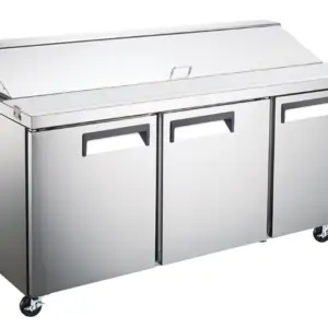 A stainless steel refrigerated salad and sandwich prep table with three doors.
