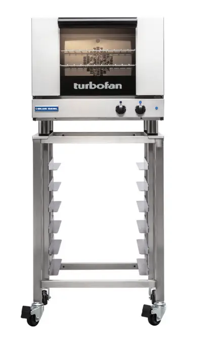 A compact stainless steel Blue Seal Turbofan convection oven.